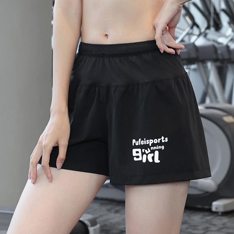 Dame Sporty Løbeshorts med sideventilation og elastisk talje Stilla