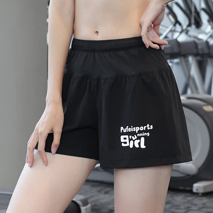 Dame Sporty Løbeshorts med sideventilation og elastisk talje Stilla