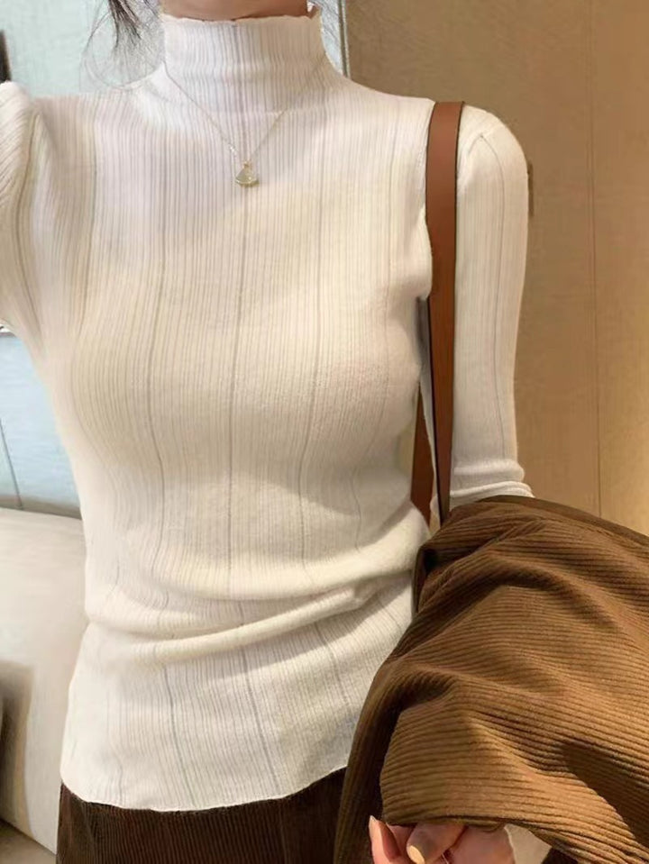 Dame finstrikket sweater i et moderne snit med høj krave Stilla