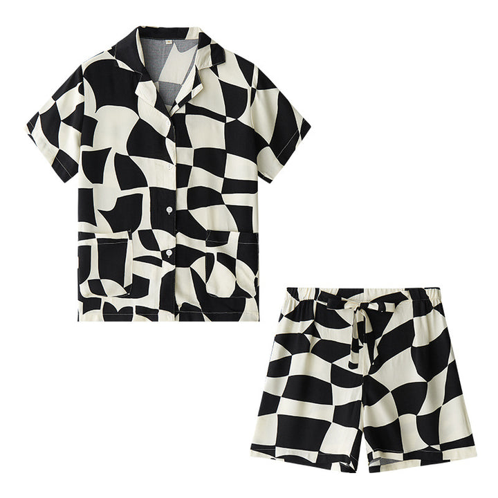 Dame Pyjamasæt med legende geometrisk design og praktiske lommer Stilla