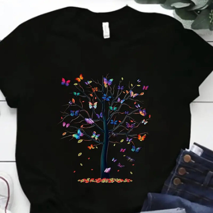 Dame T-shirt med livlig træ- og sommerfugletryk Stilla