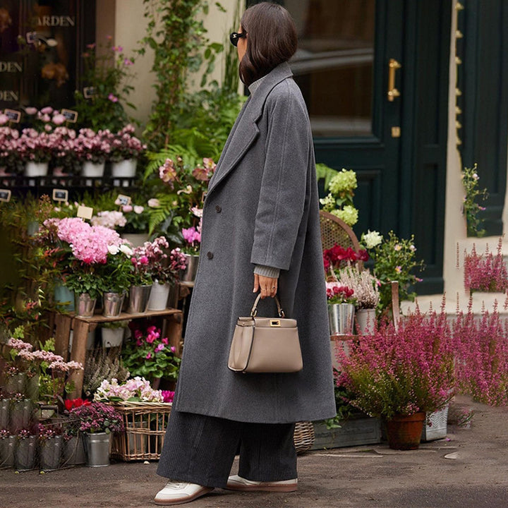 Dame Elegant Uldfrakke i Oversized-snit med dyb revers og praktiske lommer Stilla