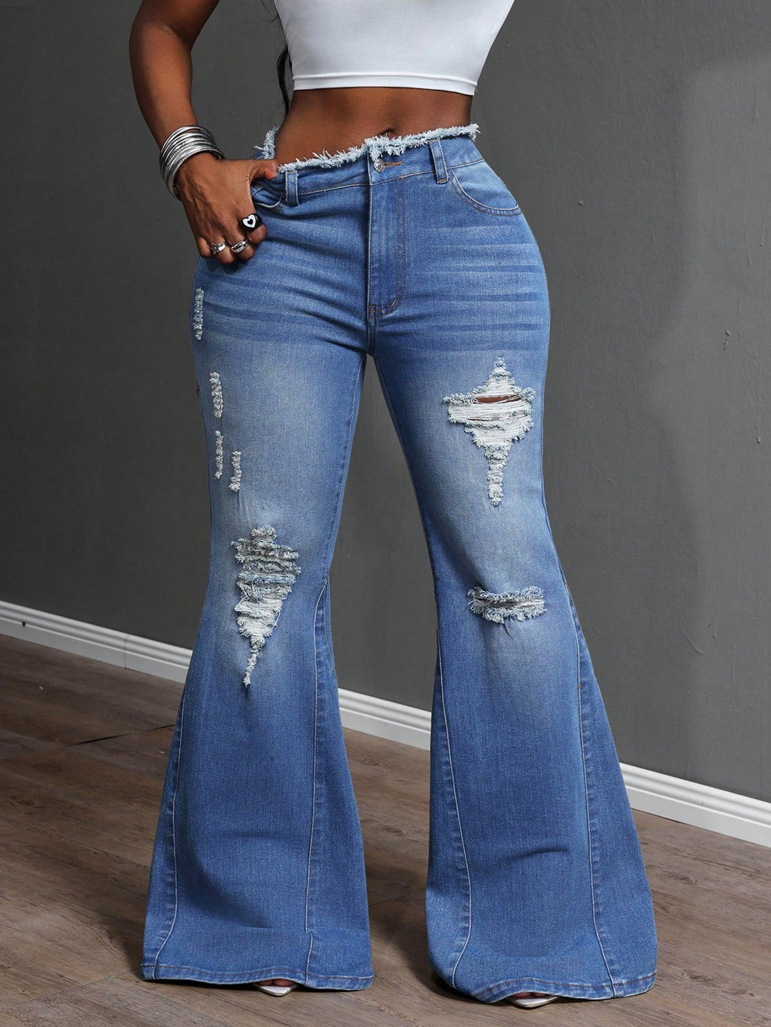 Kvinders bootcut jeans med frynsede detaljer Stilla