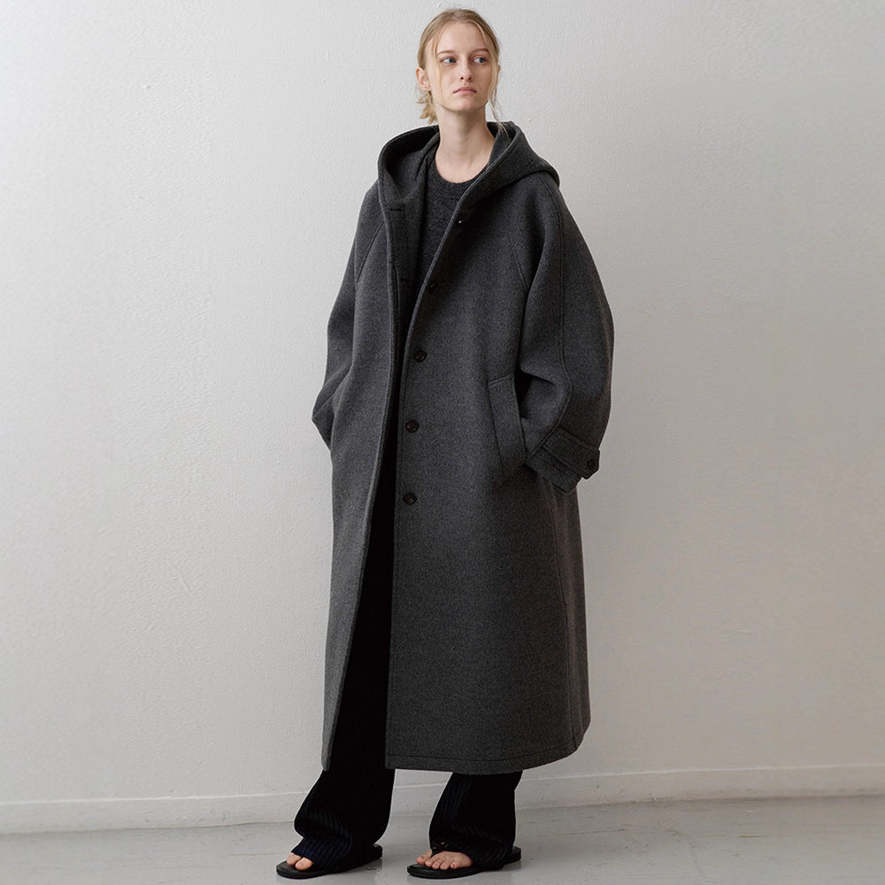 Kvinders elegante oversized jakke med hætte og praktiske lommer Stilla