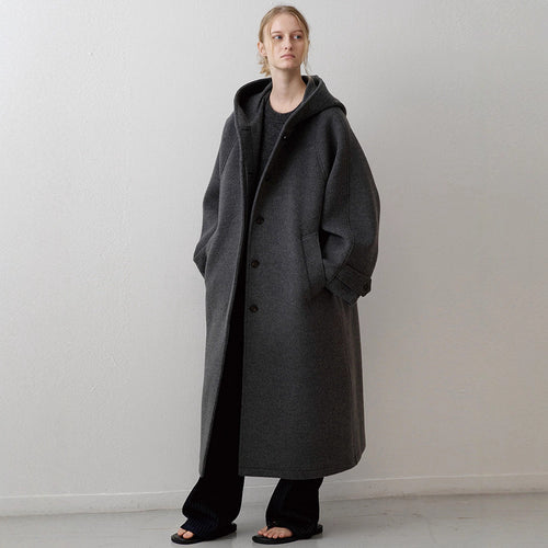 Kvinders elegante oversized jakke med hætte og praktiske lommer Stilla
