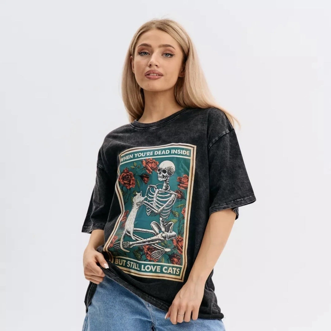 Dame T-shirt med kreativt skeletdesign og legende dyremotiv Stilla