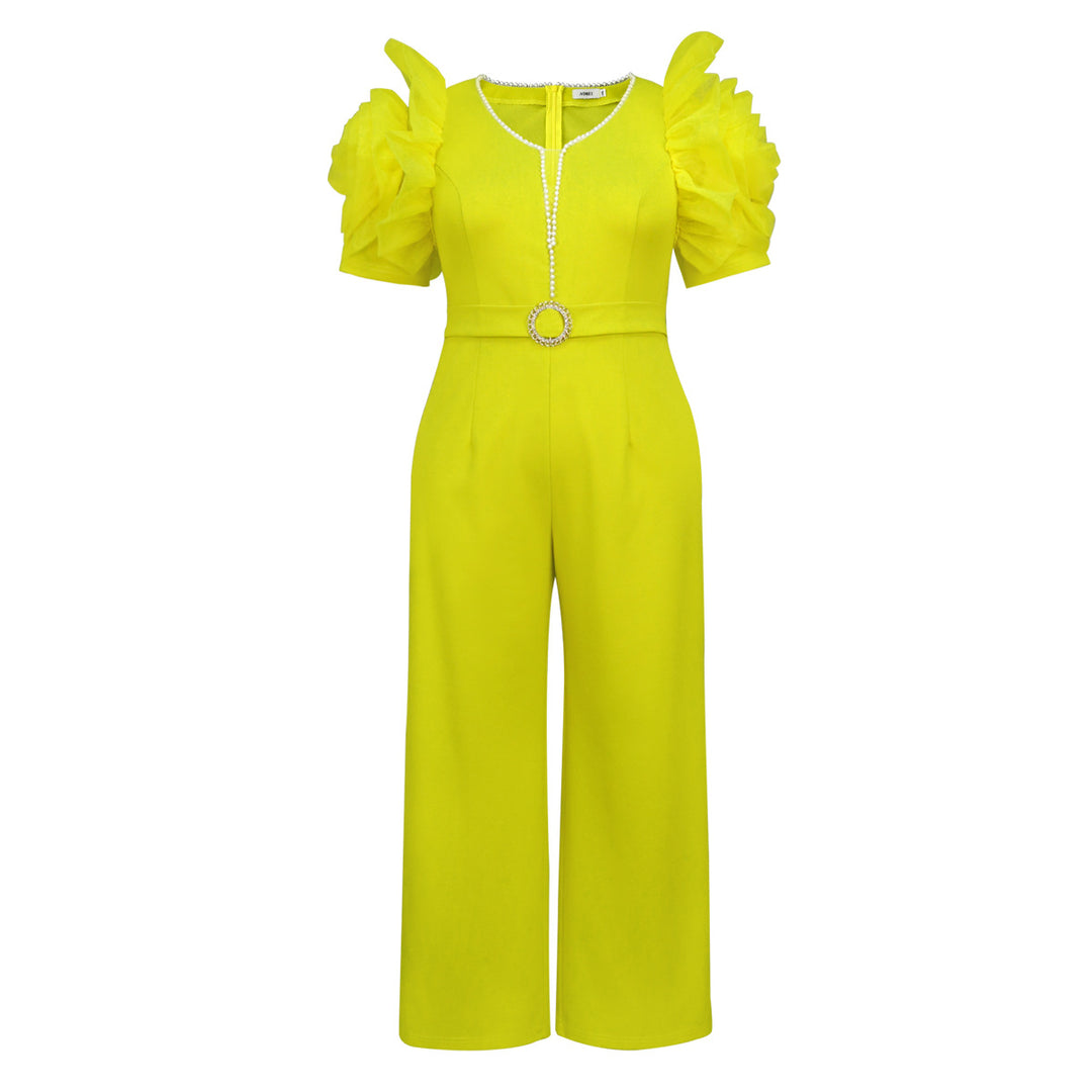 Dame elegant jumpsuit med voluminøse puffærmer og perleaccent Skovae