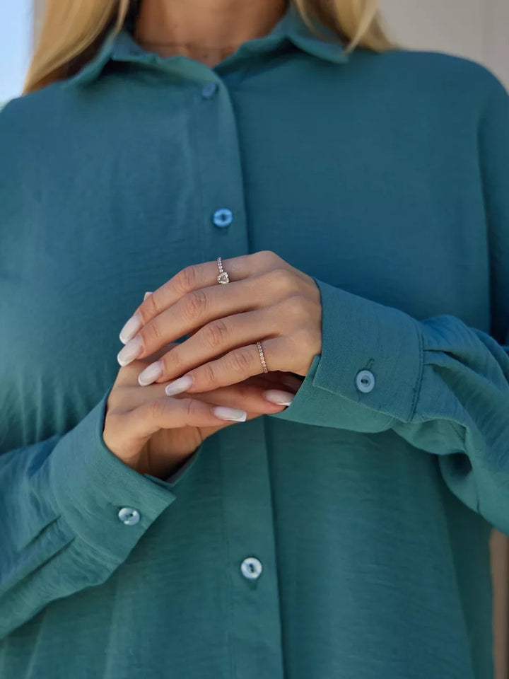 Dame Oversize Bluse med off-shoulder design og flydende snit Stilla