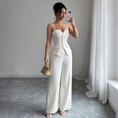 Dame Jumpsuit med elegant knaplukning og figursyet overdel Stilla