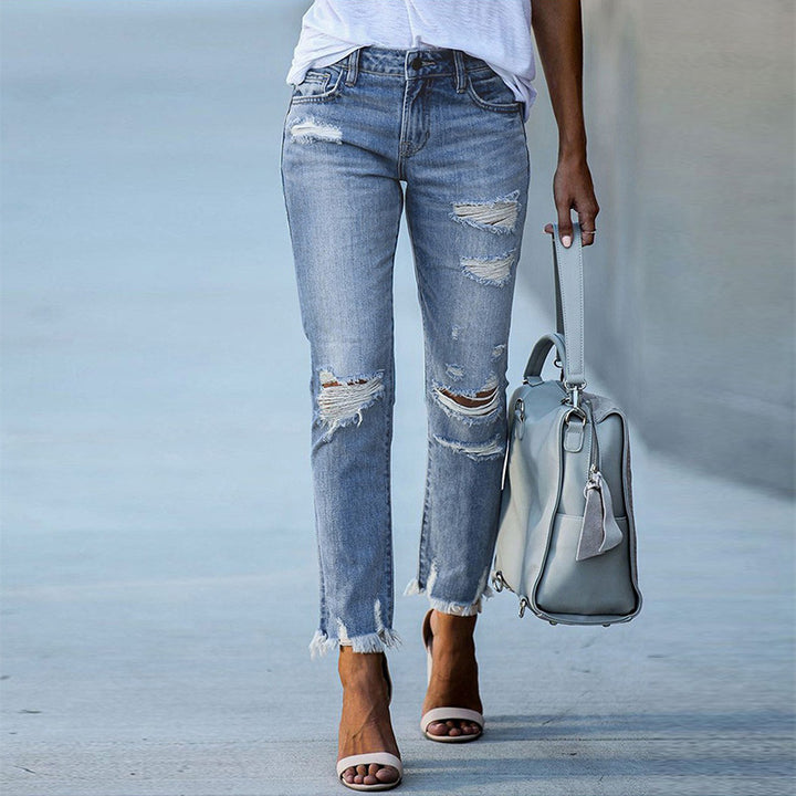 Dame Ripped High-Waist Jeans med frynset kant og modeødelæggede detaljer Stilla