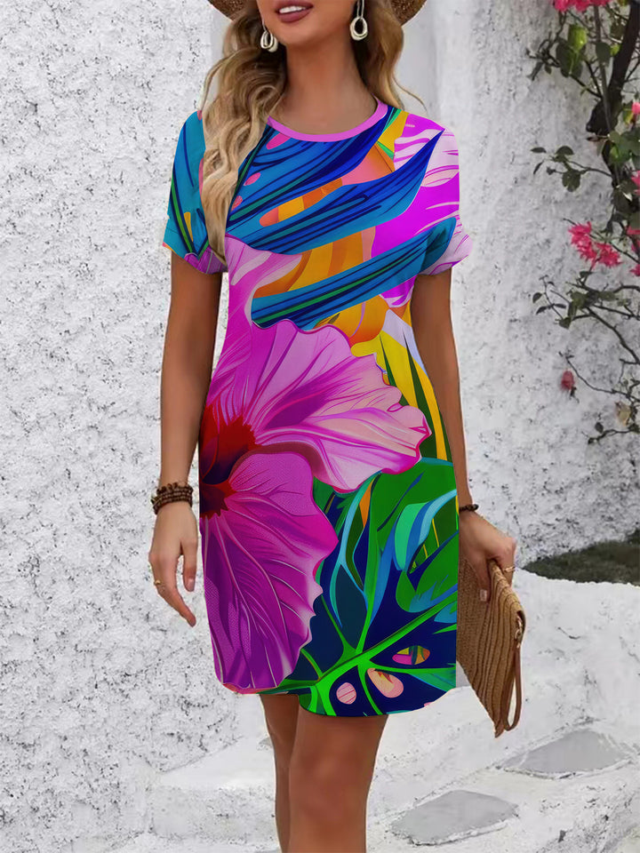 Dame afslappet T-shirt kjole med farverigt blomsterprint og behagelig pasform Skovae