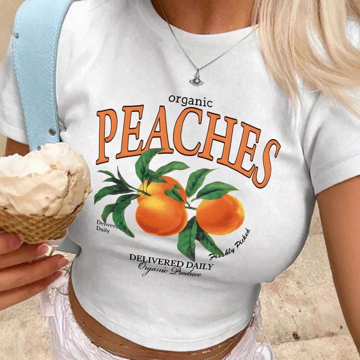 Dame T-shirt med frisk frugtmotiv og moderne skrift Skovae