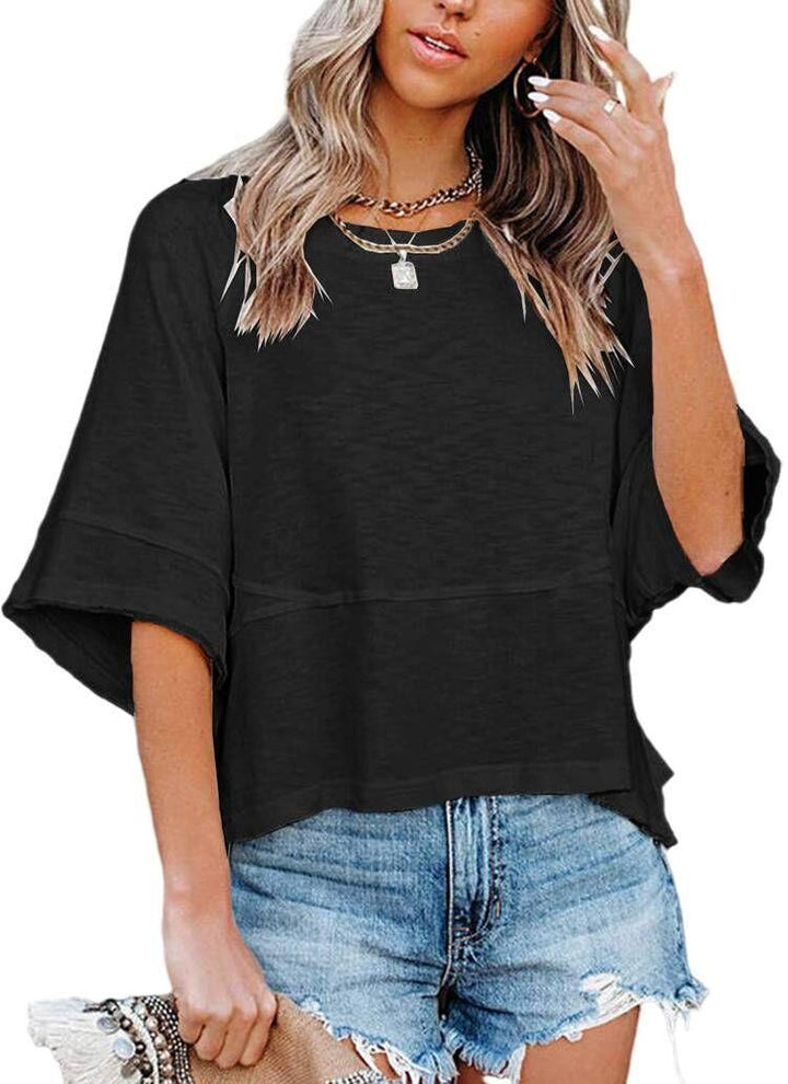 Dame afslappet oversized T-shirt med løs pasform og minimalistisk æstetik Stilla