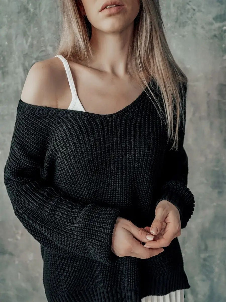 Dame Oversized Strikbluse med asymmetrisk udskæring og brede ribstrikdetaljer Stilla