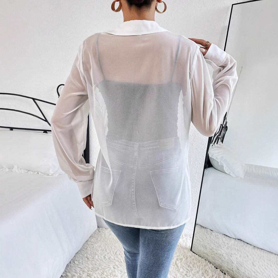 Dame afslappet transparent bluse med knaplukning og manchetter Stilla