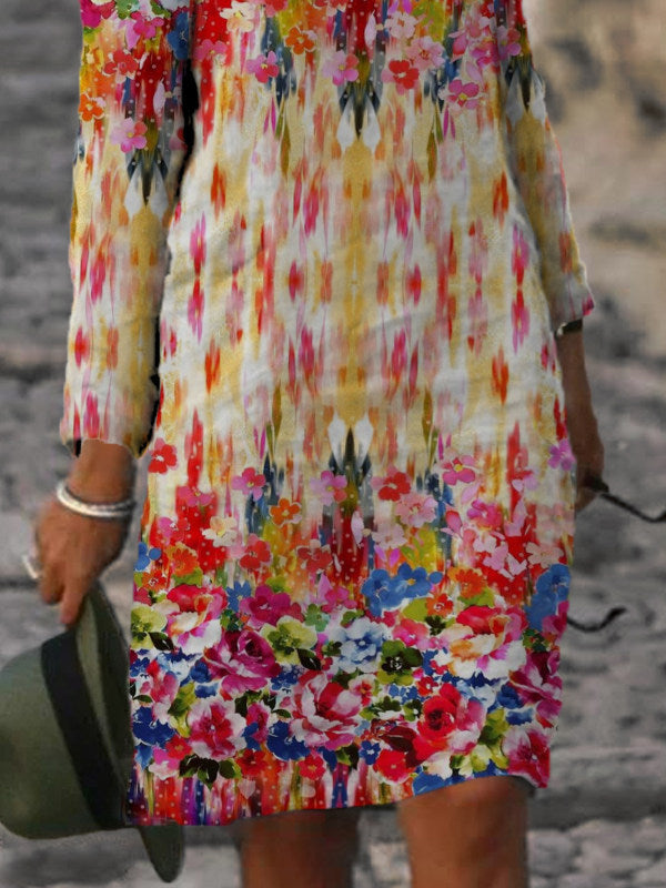 Dame Elegant sommerkjole med asymmetrisk udskæring og florale accenter Stilla