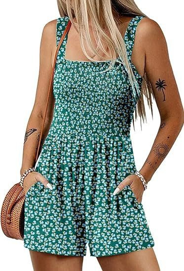 Dame jumpsuit med blomster mønster og praktiske lommer Stilla