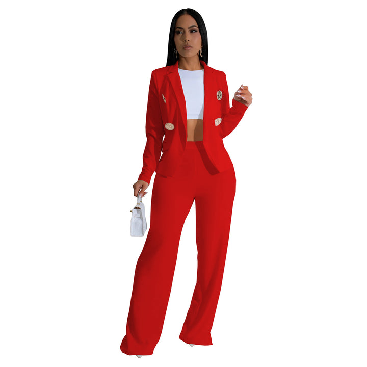 Dame elegant jumpsuit med skinnende knapdetaljer og dyb udsnit Stilla