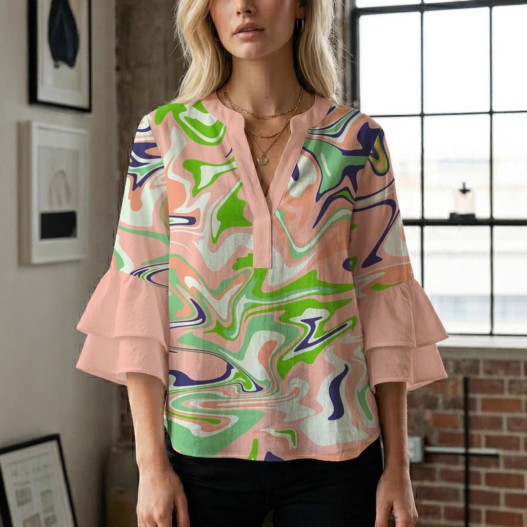 Dame bluse med voluminøse ærmer og kreativt trykdesign Skovae