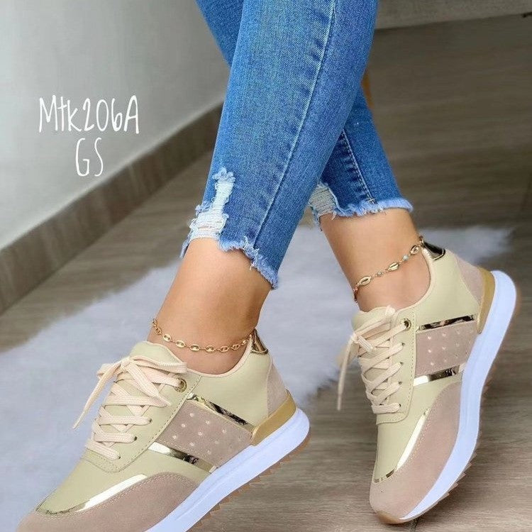 Dame mode Sneakers med en elegant glansfinish og åndbar overfladestruktur Stilla