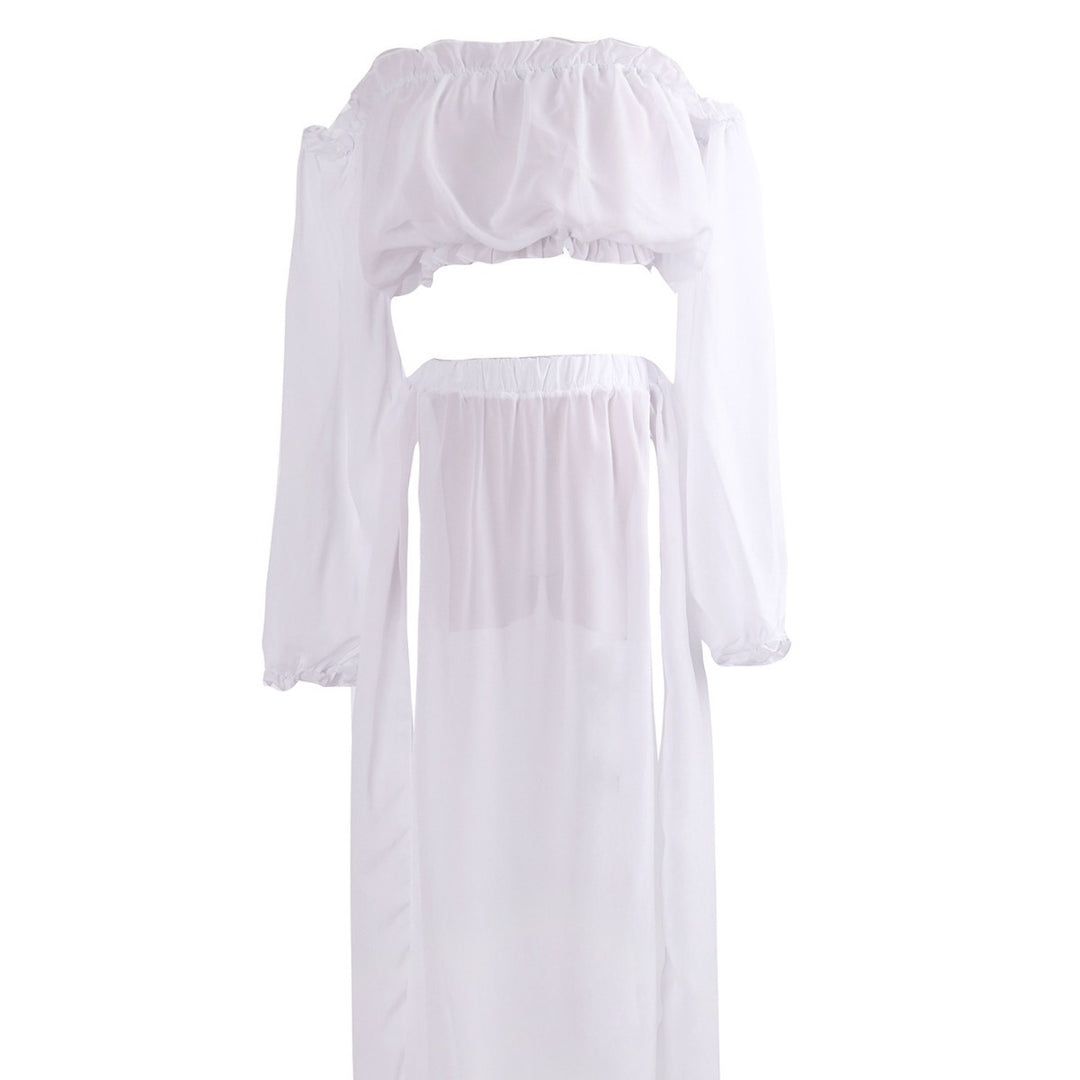 Dame cocktailkjole med off-shoulder design og voluminøse ærmer Stilla