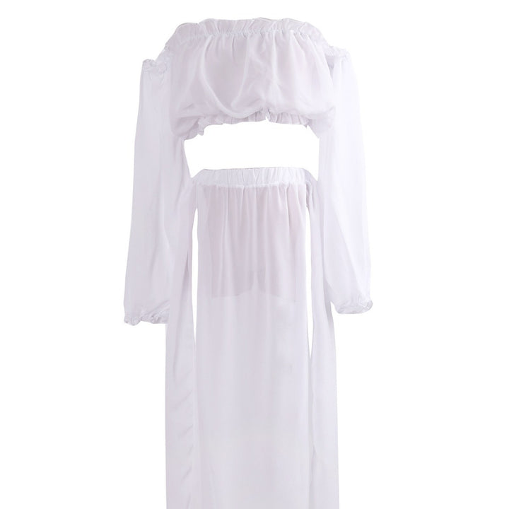 Dame cocktailkjole med off-shoulder design og voluminøse ærmer Stilla
