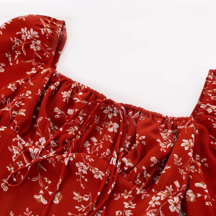 Dame Crop-top med ballonærmløs design og sarte blomsteraccenter Stilla