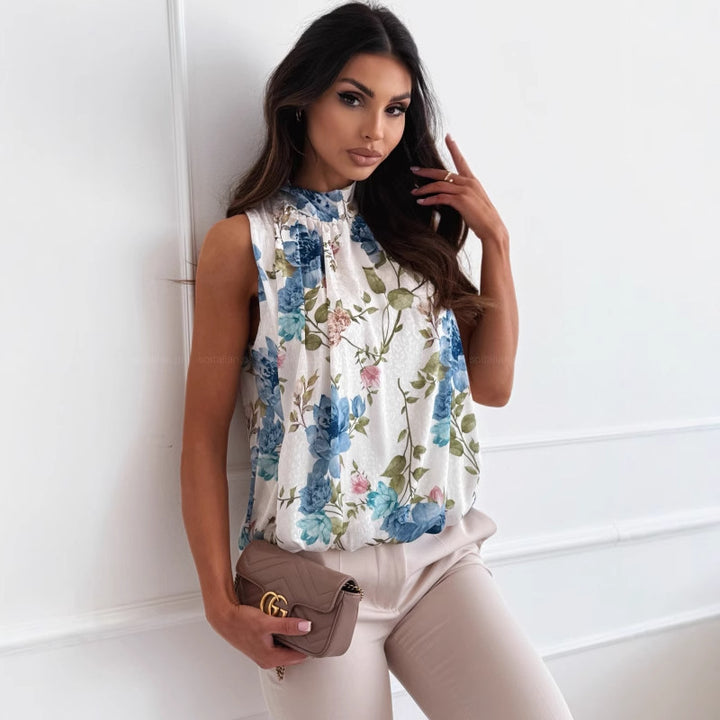 Damebluse med blomsterprint og elegant snit Stilla