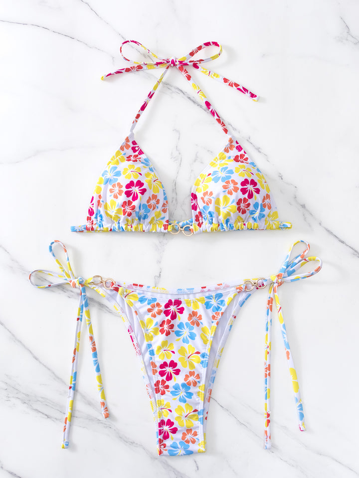 Dame triangel-bikini med alsidigt bindingssystem og livligt blomstermotiv Stilla