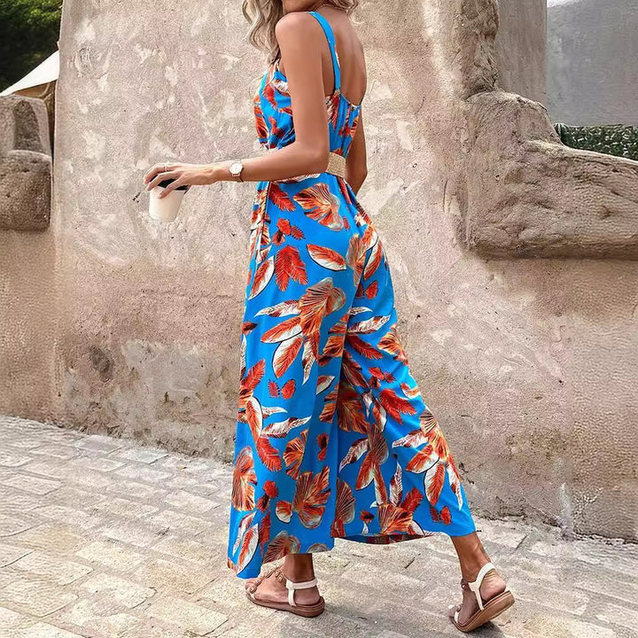 Dame jumpsuit med blomsterprint og bred ben Stilla