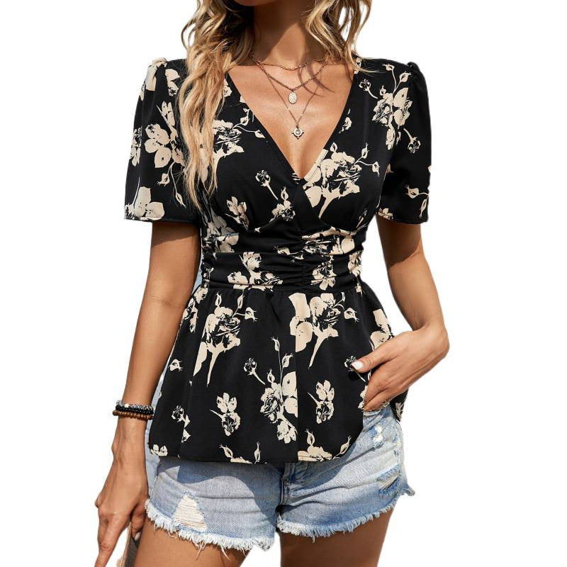 Dame blomstertrøje med peplum-design Skovae