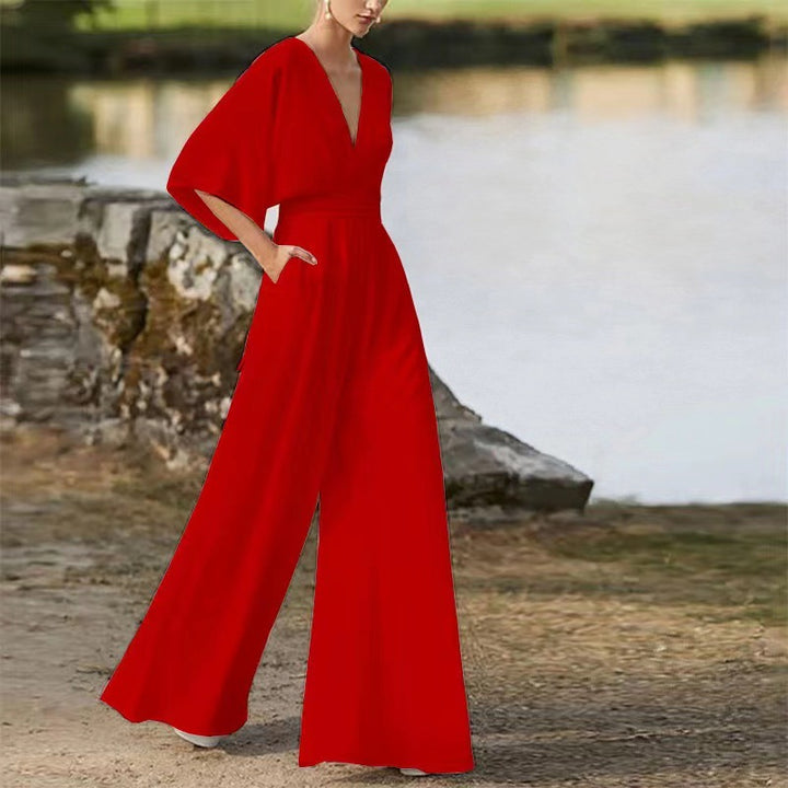 Dame jumpsuit med dyb V-udskæring og brede ben Stilla