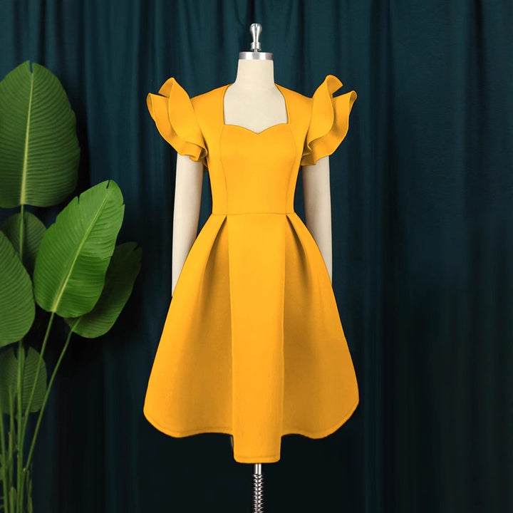 Dame elegant kjole med voluminøse flæsekanter Skovae