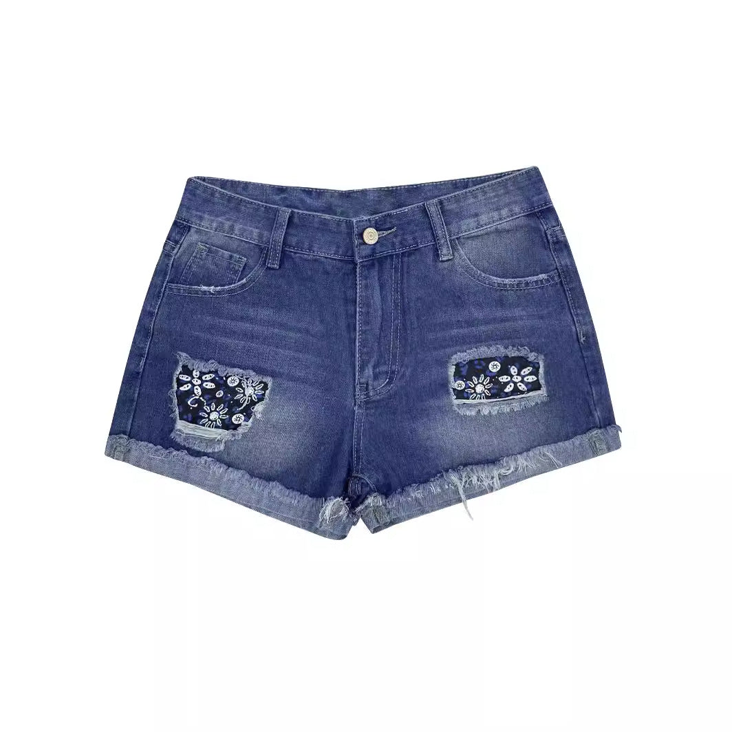Dame jeansshorts med blomster broderi detaljer og frynset kant Stilla