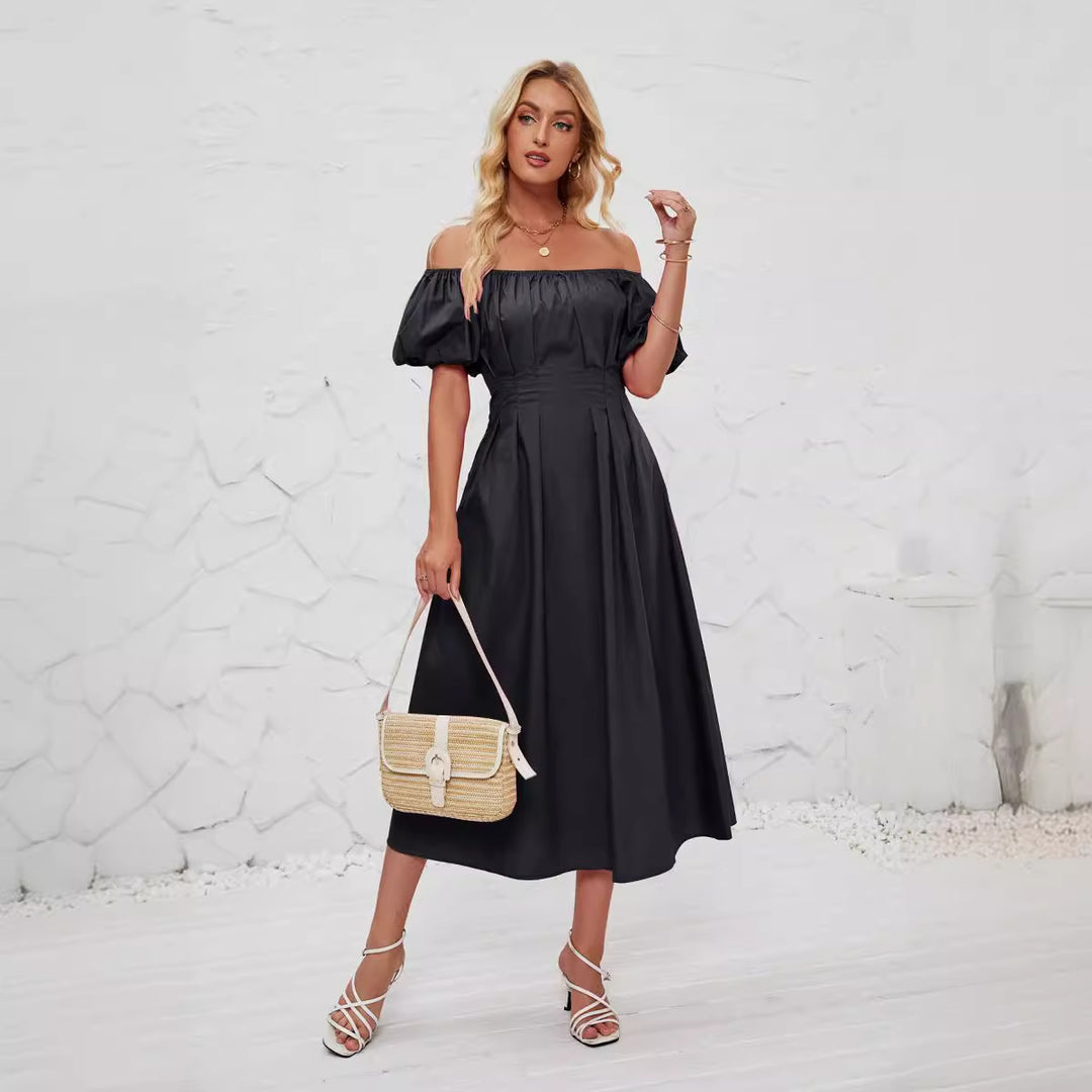 Dame Off-Shoulder Maxikjole med volumniøse puffærmer og tætsiddende snit Stilla
