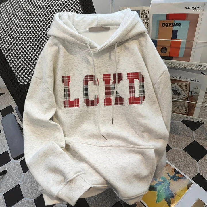 Kvindernes hætteh sweatshirt med trendy påskrift Stilla