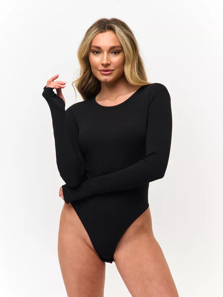 Dame langærmet bodysuit med elegant rib design og tætsiddende snit Skovae