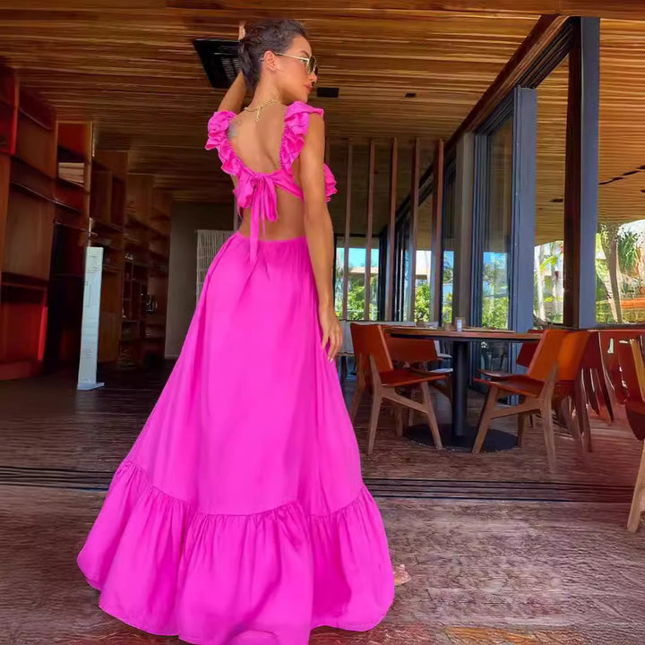 Dame maxikjole med voluminøse ruffles og elegant omskær Stilla
