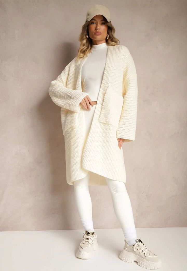 Kvinders oversized cardigan med dyb V-hals og praktiske lommer Stilla