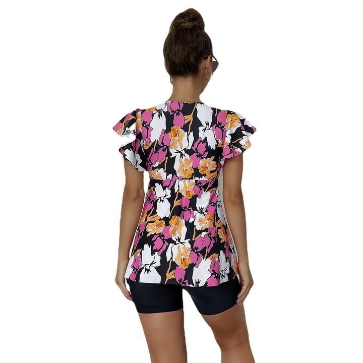 Dame badetøj med blomsterprint og elegante flæsedetaljer Stilla