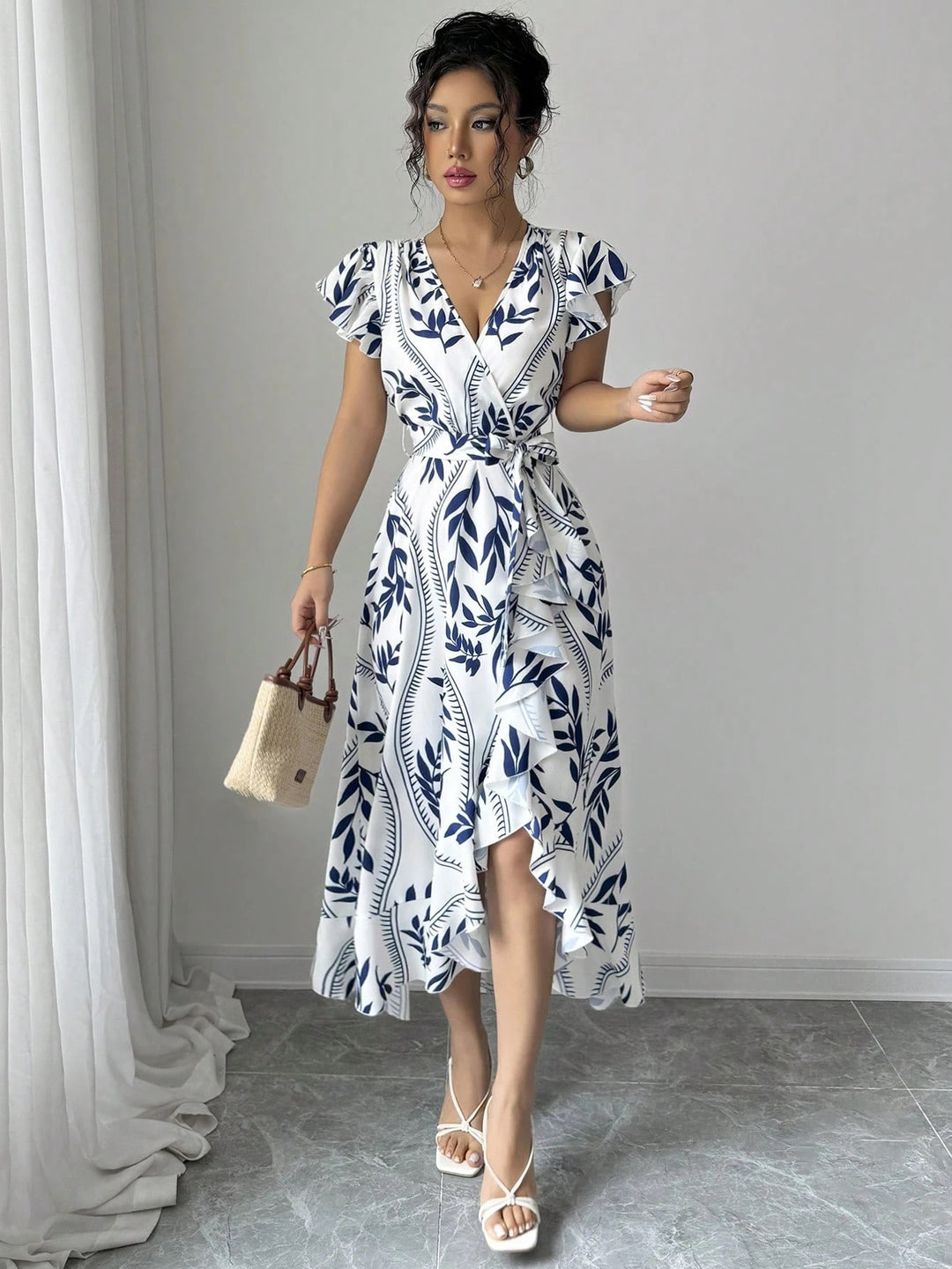 Dame ombukskjole med legende ruffles og blomstret print Stilla