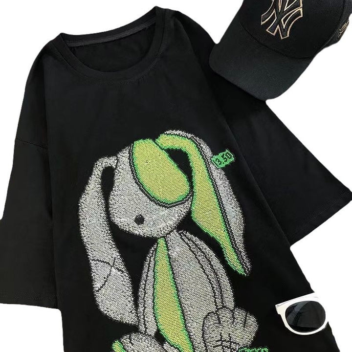 Dame T-shirt med glitrende kaninmotiv og afslappet snit Stilla