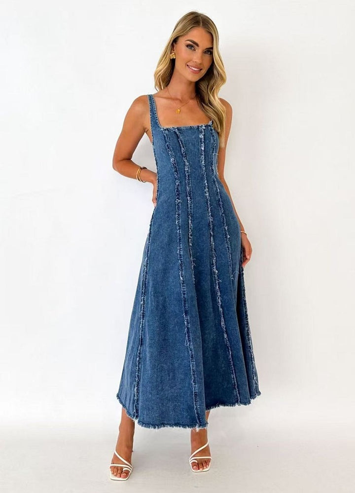 Dame Maxikjole i denim med moderne cut-out-detaljer og spidse stropper Stilla