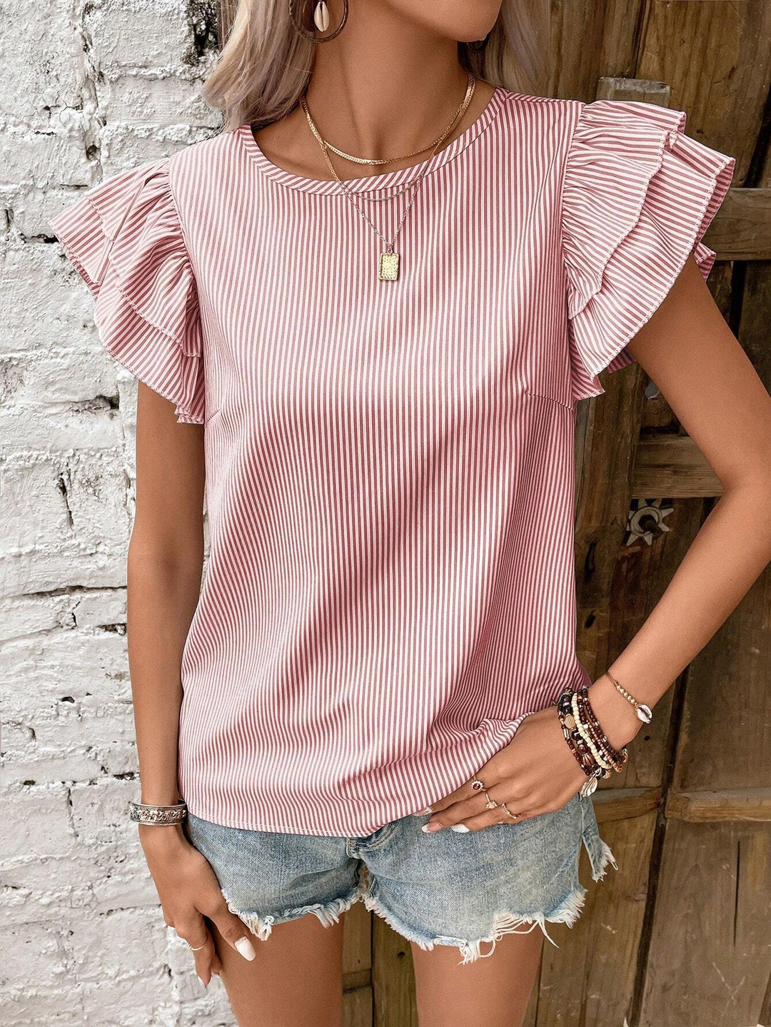 Dame striped top with voluminous ruffle sleeves Stilla