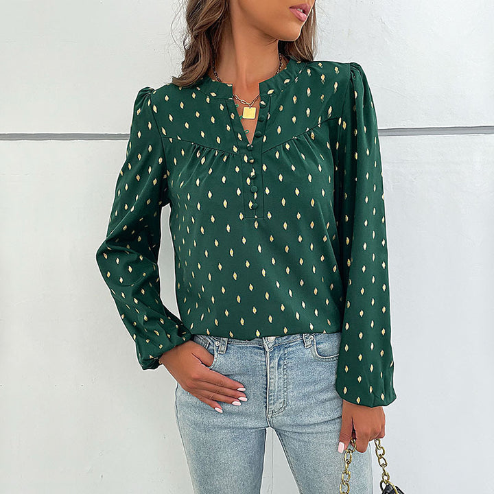 Damebluse med fint print og knapdetaljer Stilla