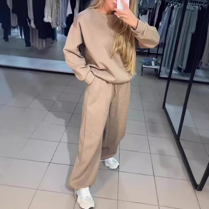 Kvinders sporty lounge sæt med glitrende detaljer og løs pasform Stilla