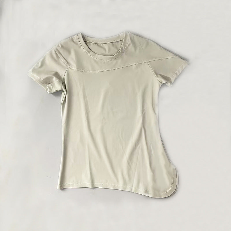 Dame Sports kortærmet T-shirt med innovativ asymmetrisk snit og åndbare egenskaber Stilla