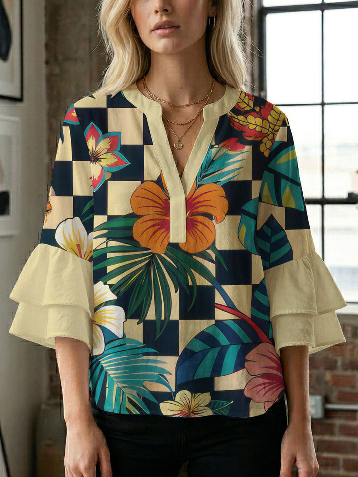 Dame bluse med voluminøse ærmer og kreativt trykdesign Skovae