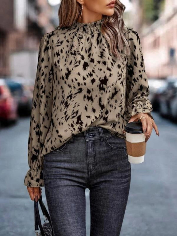 Damebluse med legende mønster og høj krave Stilla