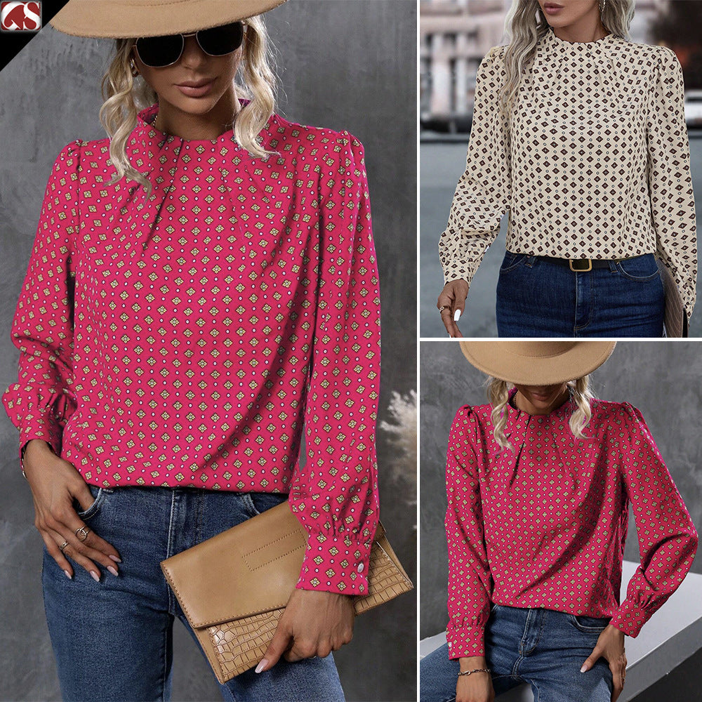 Damebluse med elegant spidsedetalje og blomstret design Stilla